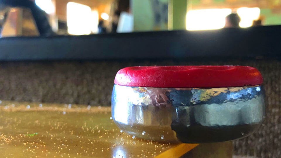 Shuffleboard Puck Haning
