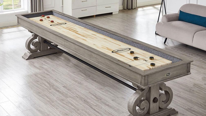 Shuffleboard Pucks on a 12-Foot Imperial Shuffleboard Table