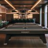 Rasson Acurra pool tables in Strong Black in a pool hall